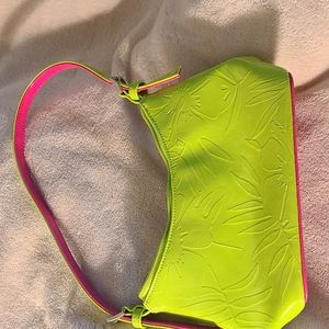 Small patent looking purse. Chartreuse, hot pink, polka dot lining. SUNNY Hawaii